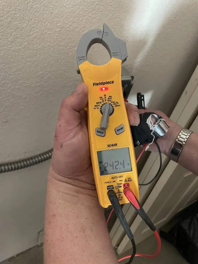 Voltage testing with clamp meter during Circuit Breaker Repair in Snyderville